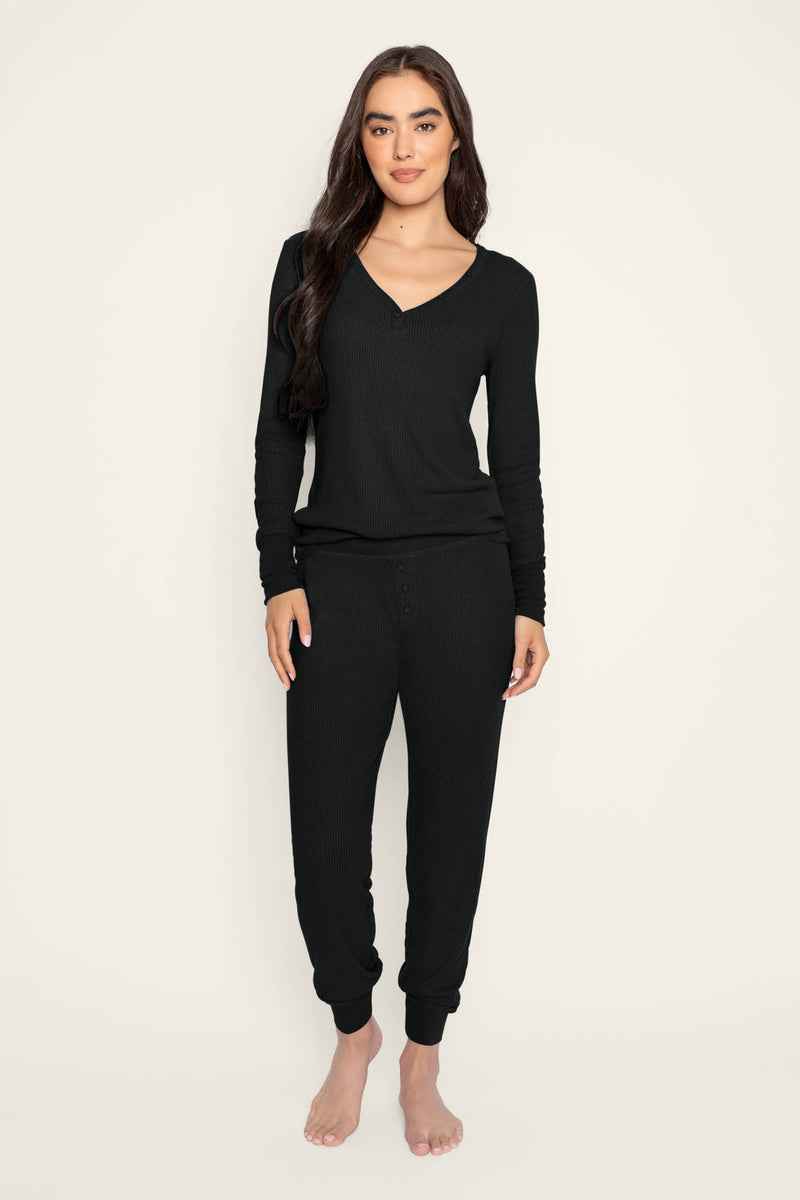 Black ribbed pyjama set, long sleeve V-neck Henley top and banded ankle pant, front view