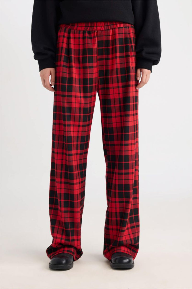 Red and black buffalo plaid pants, wide straight leg, front view