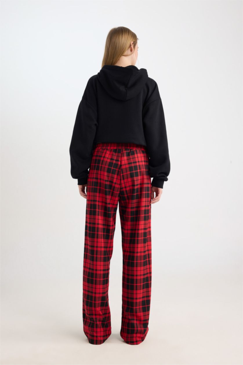 Buffalo plaid pants, back view showing the straight leg fall