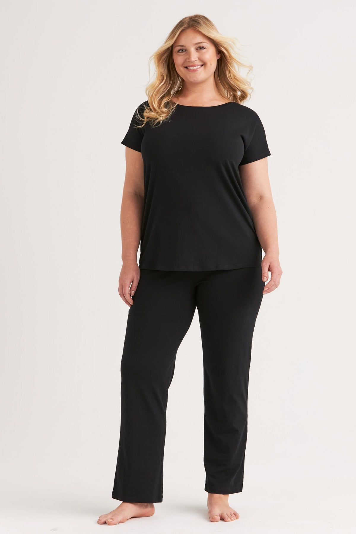 Black cotton pyjama set, short sleeve top and full length pants, front view