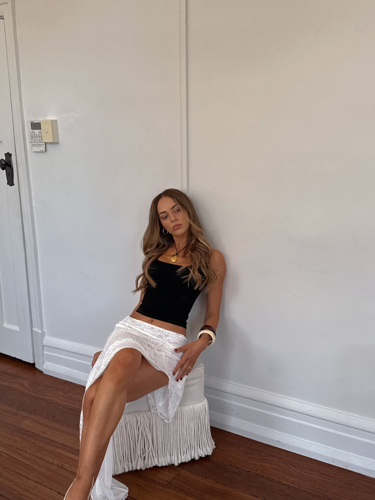 Black ribbed crop top worn out for the day